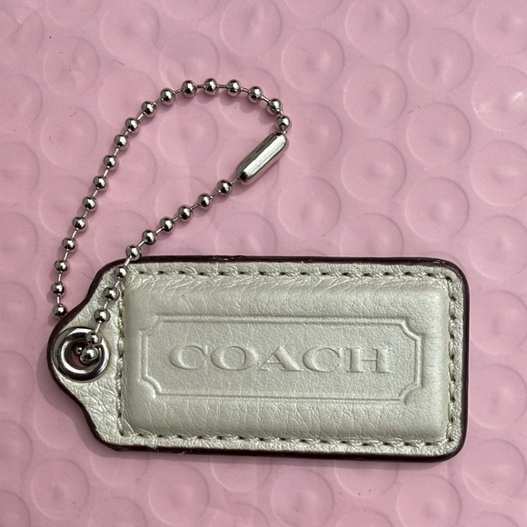 Coach Handbags - Coach White Pearls Hangtag Coach Keychain Coach bag accessories